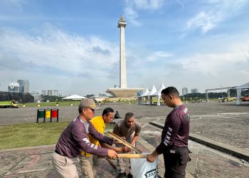 Polri Lakukan Bersih-bersih Usai Pesta Rakyat di Monas