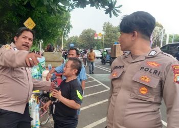 Personil Unit Reskrim Berikan Pengamanan Dan Pelayanan Di Tugu Tani