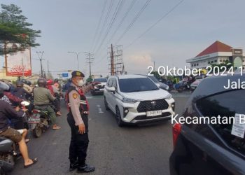 Patko 9401 Polsek Rawa Lumbu Laksanakan Gatur Lalin Sore di Perempatan Kampus Unisma